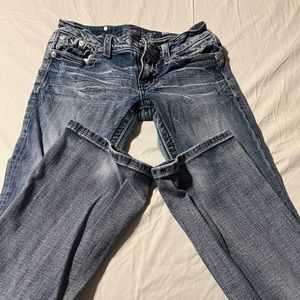 Miss me boot cut jeans! Embroidered pockets. Lower rise jeans. Never altered.